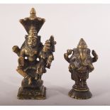 TWO SMALL INDIAN BRASS FIGURES of deities, 9cm and 6cm.