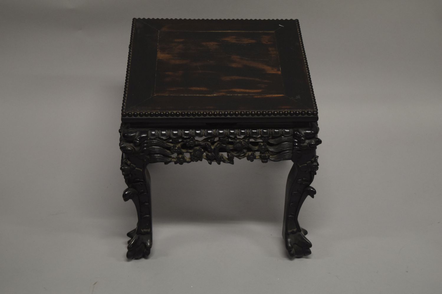 A SMALL CHINESE SQUARE FORM HARDWOOD TABLE, with carved floral frieze, supported on four curving - Image 5 of 6