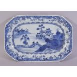 A CHINESE BLUE AND WHITE RECTANGULAR PORCELAIN DISH, the centre painted with a river landscape