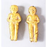TWO GOLD OR GILT METAL FIGURAL PENDANTS, both approx 4cm (untested).