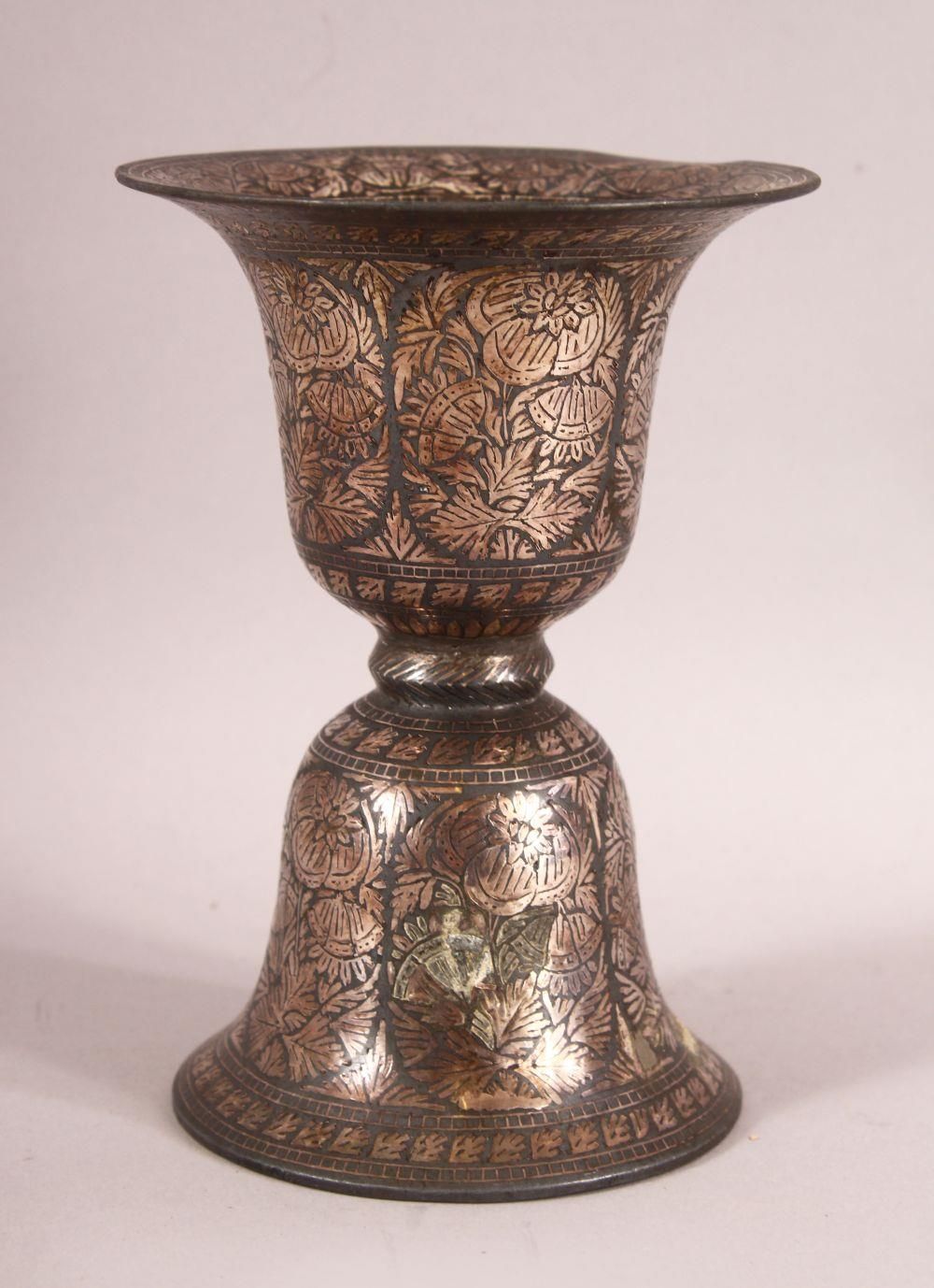 A SMALL SILVER INLAID BIDRI SPITTOON, 15cm high, 11cm diameter.