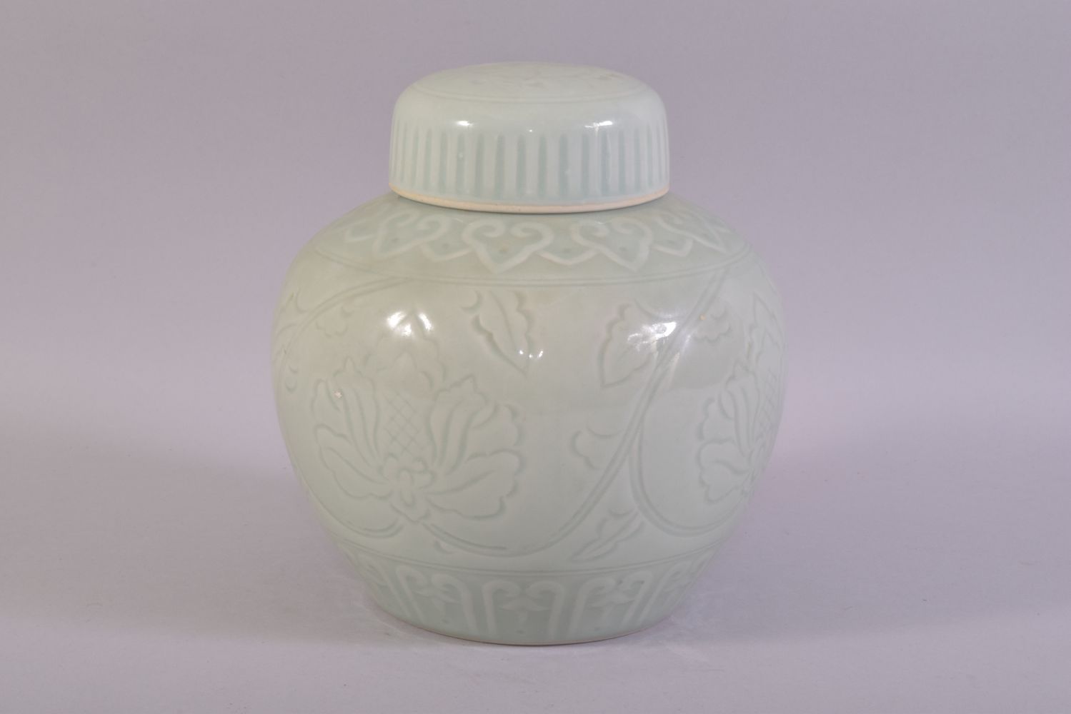 A GOOD CHINESE CELADON PORCELAIN JAR AND COVER, with incised floral decoration under glaze, 19.5cm - Image 3 of 9