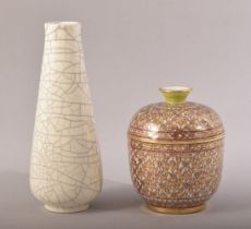 A PORCELAIN GILT DECORATED POT AND COVER, 12cm high, together with a chinese crackle glaze vase,
