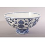 A CHINESE MING STYLE BLUE & WHITE LOTUS PORCELAIN STEM BOWL - The interior with a six character mark