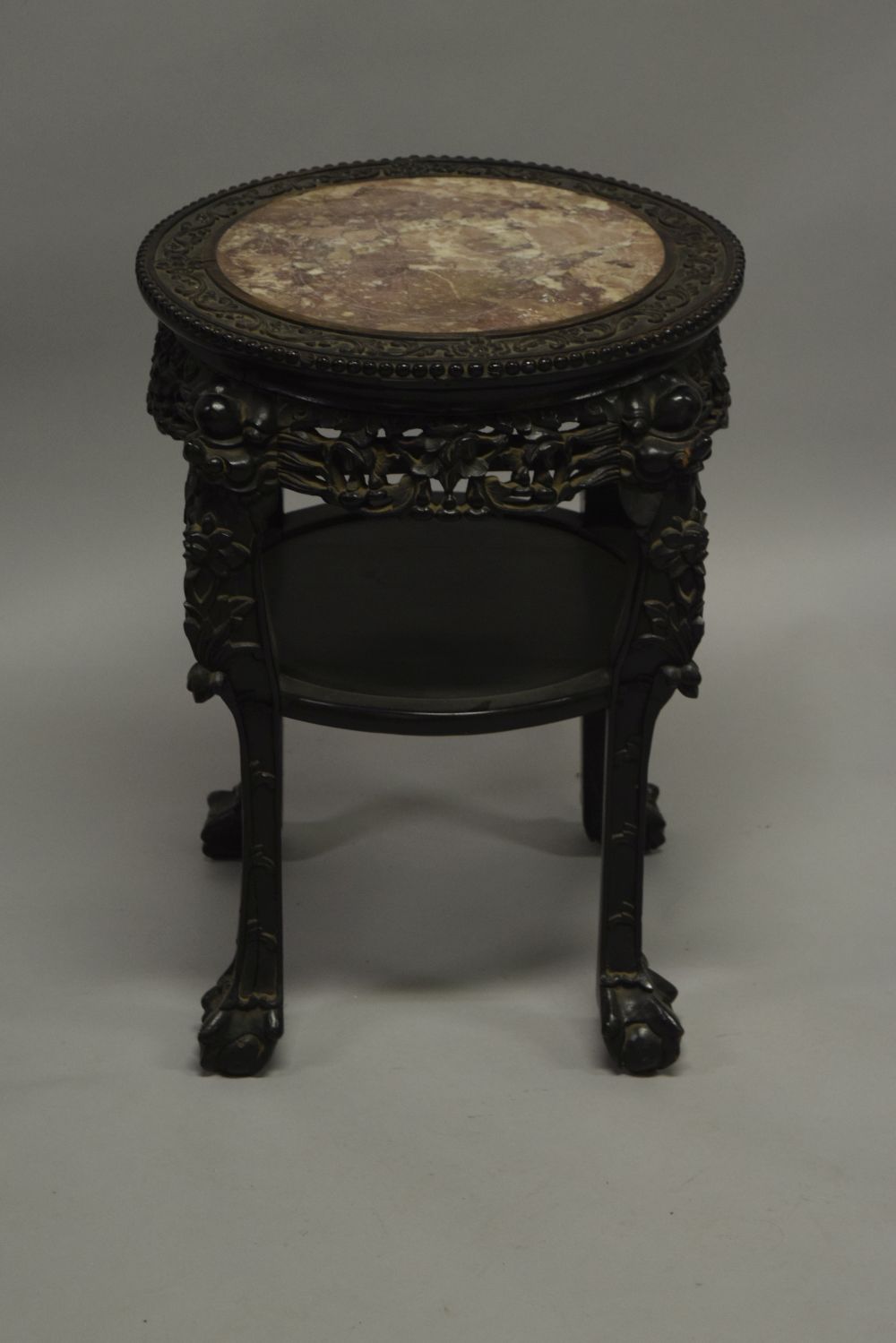 A CHINESE CARVED HARDWOOD MARBLE TOP TWO TIER STAND, the frieze carved with foliate decoration, - Image 6 of 6