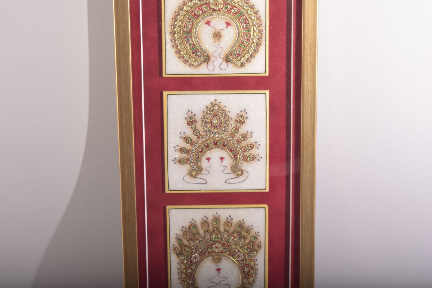A SET OF FOUR TANJORE RAJASTHAN PAINTED MARBLE TILES, painted in gold and overlaid with semi- - Image 3 of 5