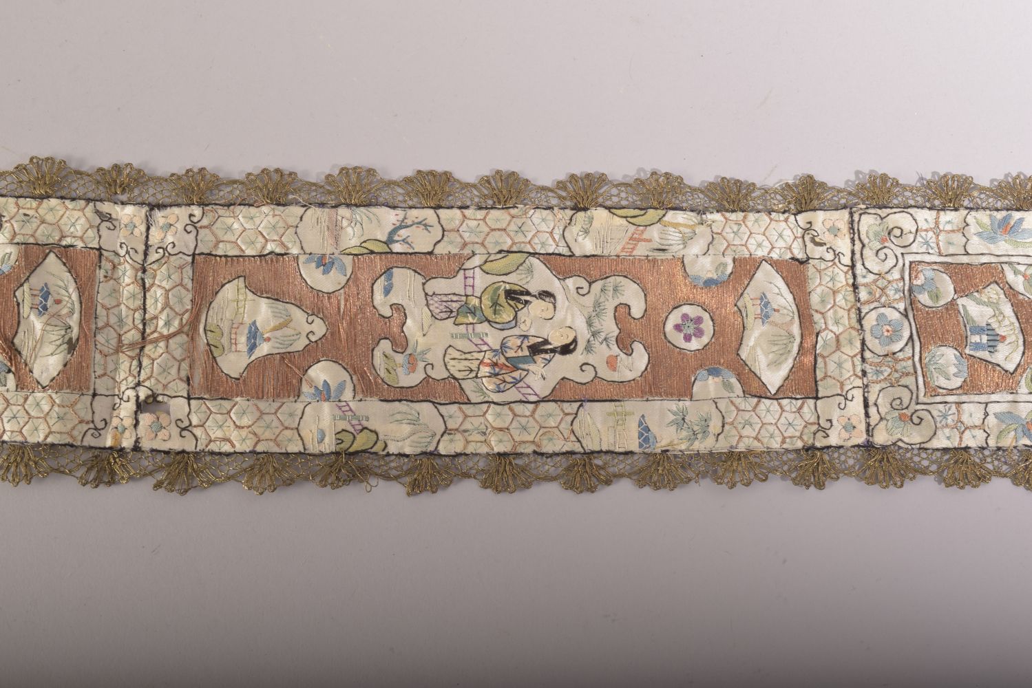 A CHINESE EMBROIDERED SILK TEXTILE, embroidered with various panels of figures, 96cm long. - Image 3 of 5