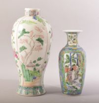 A CHINESE FAMILLE ROSE / VERTE VASE, painted with native flora, 26cm high, together with a smaller