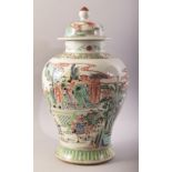 A CHINESE FAMILLE VERTE PORCELAIN VASE AND COVER, painted with scenes of warriors and other