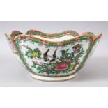 A 19TH CENTURY CHINESE CANTON FAMILLE ROSE PORCELAIN LOBED BOWL - the bowl with a lobed rim,