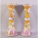 A PAIR OF JAPANESE SATSUMA / TYZAN TRUMPET SHAPED VASES, decorated with flowers and gilt highlights,