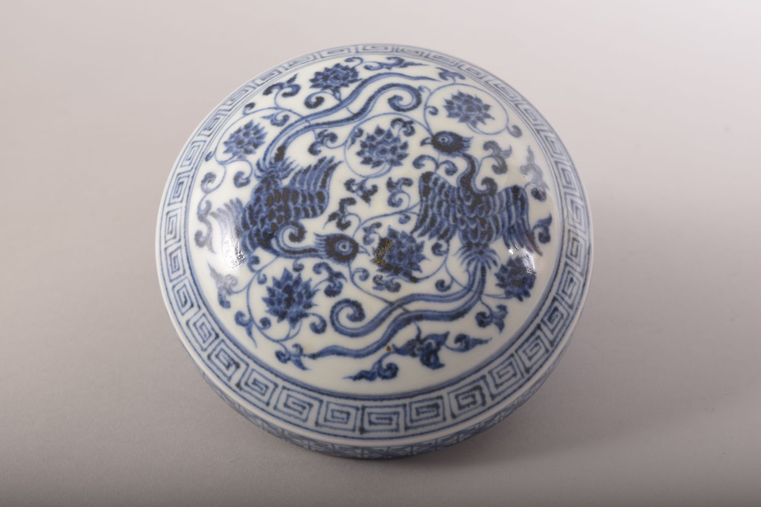 A CHINESE BLUE AND WHITE PORCELAIN CIRCULAR BOX AND COVER, the cover decorated with phoenix, lotus - Image 4 of 8