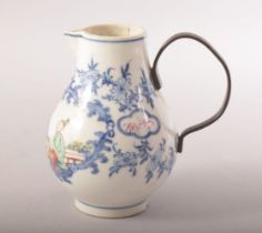 A SMALL CHINESE PORCELAIN JUG, painted with a panel of figures, mounted metal handle, (af), 11cm