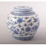 A GOOD CHINESE BLUE AND WHITE PORCELAIN JAR AND COVER, painted with phoenix, lotus and scrolling