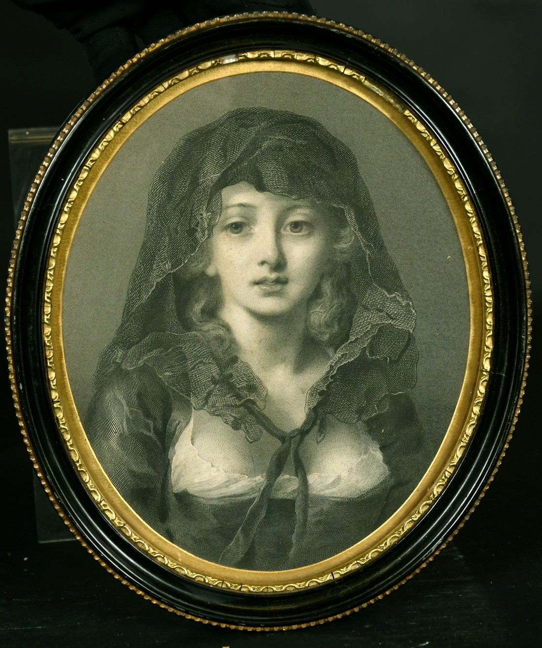 A 19th Century engraving of a bust length portrait of a female in a headdress, 8.5" x 6.75" oval. - Image 2 of 3