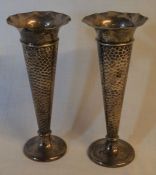 Pair or near pair silver specimen vases with flared rims & weighted bases. London 1902 & 1904 approx