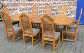 Large continental draw leaf table with 8 chairs extending to 276cm by 107cm