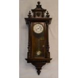 Vienna regulator wall clock in a mahogany case with a 2 train spring driven movement with mask