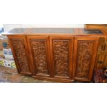 Teak drinks cabinet/bar with oriental style carved panels. Closed Ht108cm W92cm D47cm