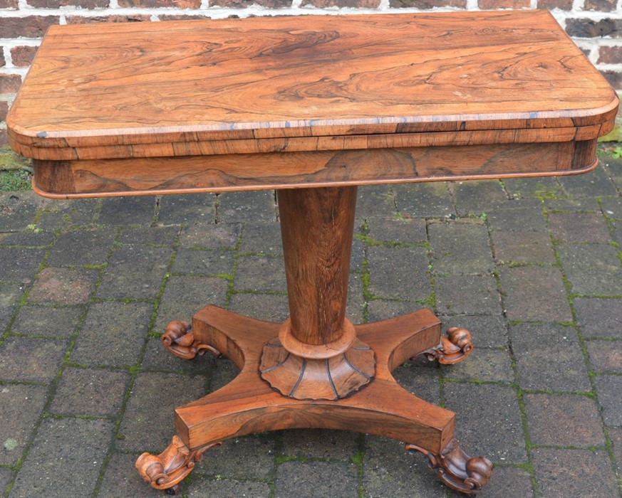 William IV/ early Victorian rosewood fold over pedestal card table on scroll feet