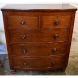 Victorian mahogany bow fronted chest of drawers on turned feet with mother of pearl inlaid knobs