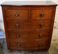 Victorian mahogany bow fronted chest of drawers on turned feet with mother of pearl inlaid knobs