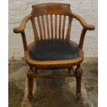 Early 20th century smokers bow/captains chair. Measures 45.5cm from seat to floor