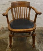 Early 20th century smokers bow/captains chair. Measures 45.5cm from seat to floor