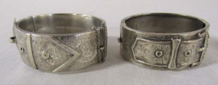 2 silver buckle bangles, one marked silver the other Birmingham 1935 total weight 2.47 ozt / 76.8 g