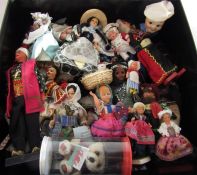 Box of tourist dolls in vintage costumes