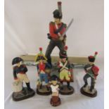 Selection of resin military figurines (tallest 53 cm) and 4 military posters