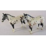 Pair of Beswick Appaloosa horses H 20 cm (one horse damage to back leg)