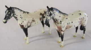 Pair of Beswick Appaloosa horses H 20 cm (one horse damage to back leg)