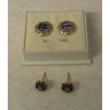 Pair of 9ct gold diamond and possibly ruby cluster earrings D 7 mm total weight 1.2 g & boxed pair