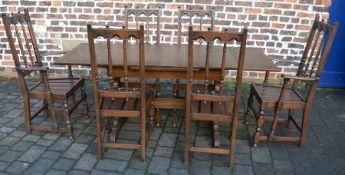 Ercol draw leaf table (176cm by 72cm) & 6 chairs including 2 carvers