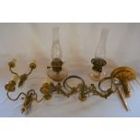 2 paraffin lamps with brass wall brackets, 2 electric wall lights, small gilded bracket & a sword