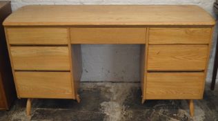 1960/70's Ercol style desk in elm wood L 142cm D 49cm Ht 77cm