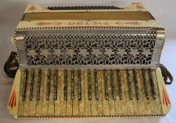 Pietro German made accordion with case (in need of some retoration)