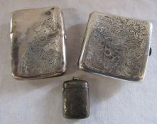 2 silver cigarette cases & a silver vesta case -  Chester 1908, Birmingham 1903 & Birmingham 1924