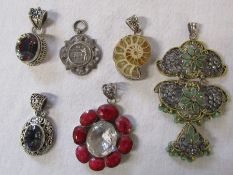 Selection of mainly silver decorative pendants and a silver shooting medal 'G Division shield 1012 W
