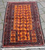 Burnt orange Afghan Baluchi nomadic rug approx 126cm by 81cm