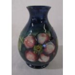 Boxed Moorcroft vase 'clematis' pattern H 11 cm