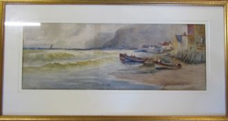 Framed watercolour of a harbour scene signed T B Hardy with fishermen in boats in foreground 88 cm x