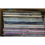 Box of assorted 33 rpm LPs including The Beatles Abbey Road, James Taylor, Barbra Streisand, John