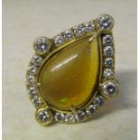 Tested as 18ct gold pear drop ring with diamonds & Mexican opal, central stone 10ct (pitted),