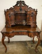 A fine quality Victorian rosewood Bonheur du jour writing desk with serpentine front on cabriole