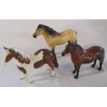 3 Beswick ponies - highland (damage to one ear), Dartmoor warlord and skewbald