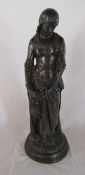 Bronze effect resin statue of a woman holding flowers H 58 cm