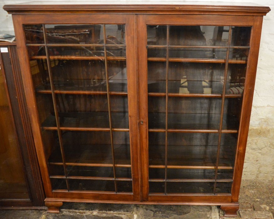 Early 20th century display cabinet on ogee bracket feet Ht 129cm L 128cm D 33cm