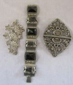 Silver grape vine brooch marked 'silver' weight 0.61 ozt L 9.5 cm, silver plated belt buckle & a